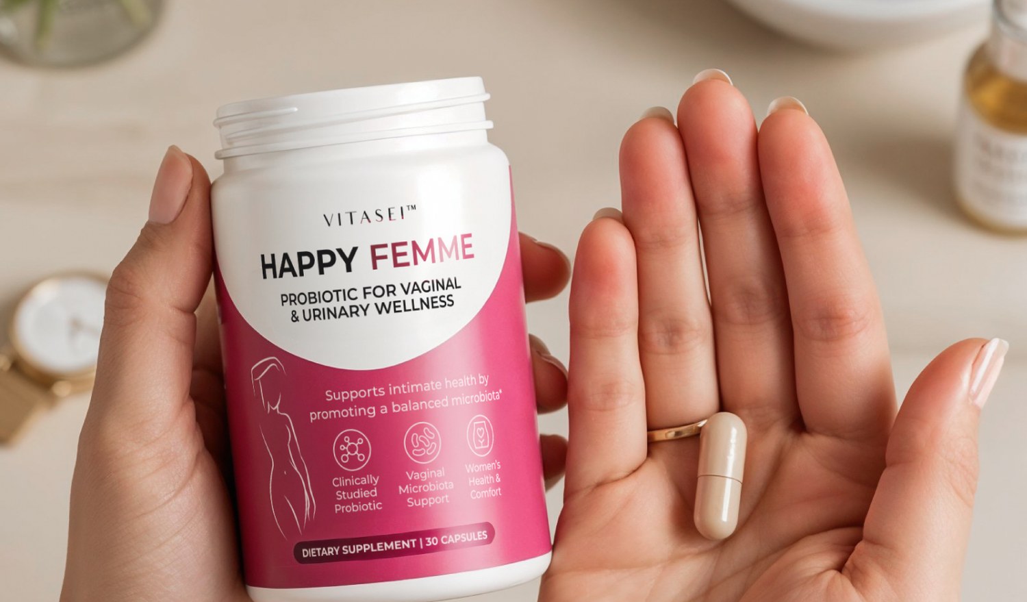 Hands holding the jar and a single capsule